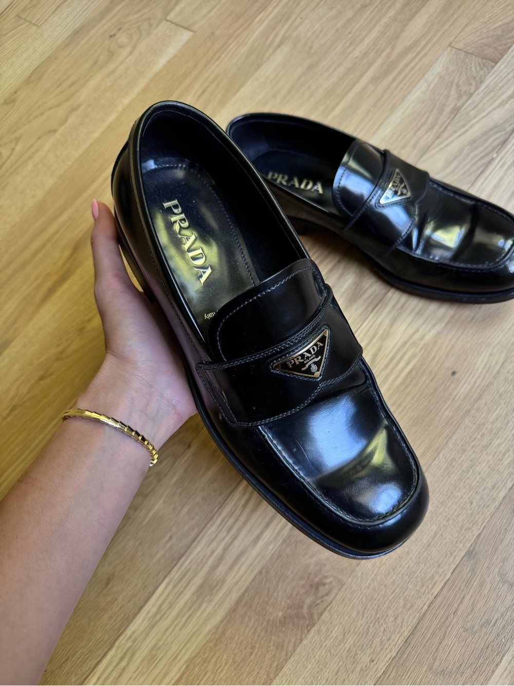 Prada Black Leather Penny Loafers with Logo Plaque